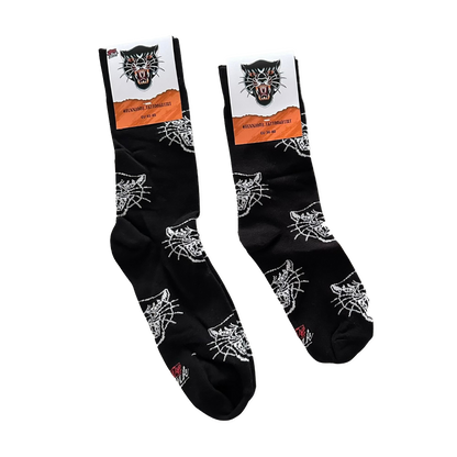 Packshot of black LOVEINK socks featuring a white panther head design, with labels indicating sizes EU 36-40 and EU 41-45.